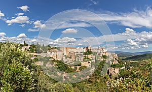 Panoramic view of Gordes forest rock and old village on Luberon massif inÃÂ French Prealps. Vaucluse, Provence